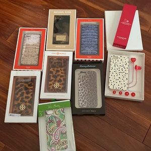 iPhone 5 cases 9 of them. See all brands. Tory Burch. Coach comes w hp. All  $50